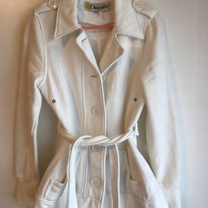 White pea coat with waist tie.